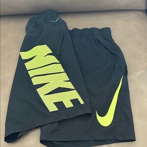 Nike Men's Dark Gray Shorts with Neon Yellow Logo